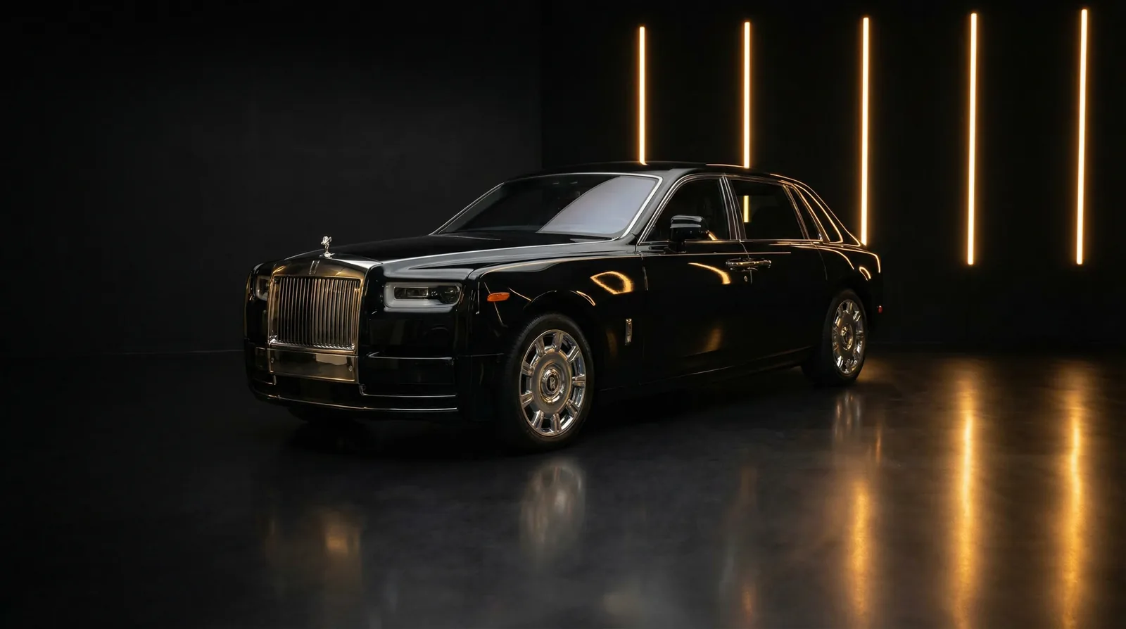 Black Rolls-Royce Phantom in studio lighting, the flagship luxury chauffeur vehicle of Seven Star Chauffeurs in Vancouver